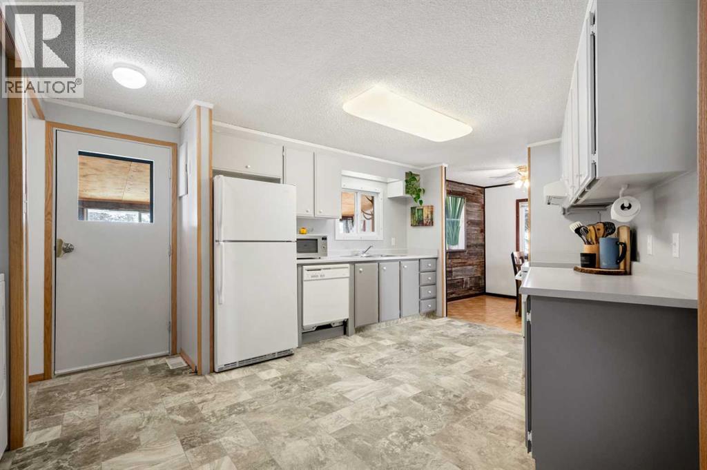 157 Spring Haven Mews Se, Airdrie, Alberta  T4A 1A8 - Photo 9 - A2293527