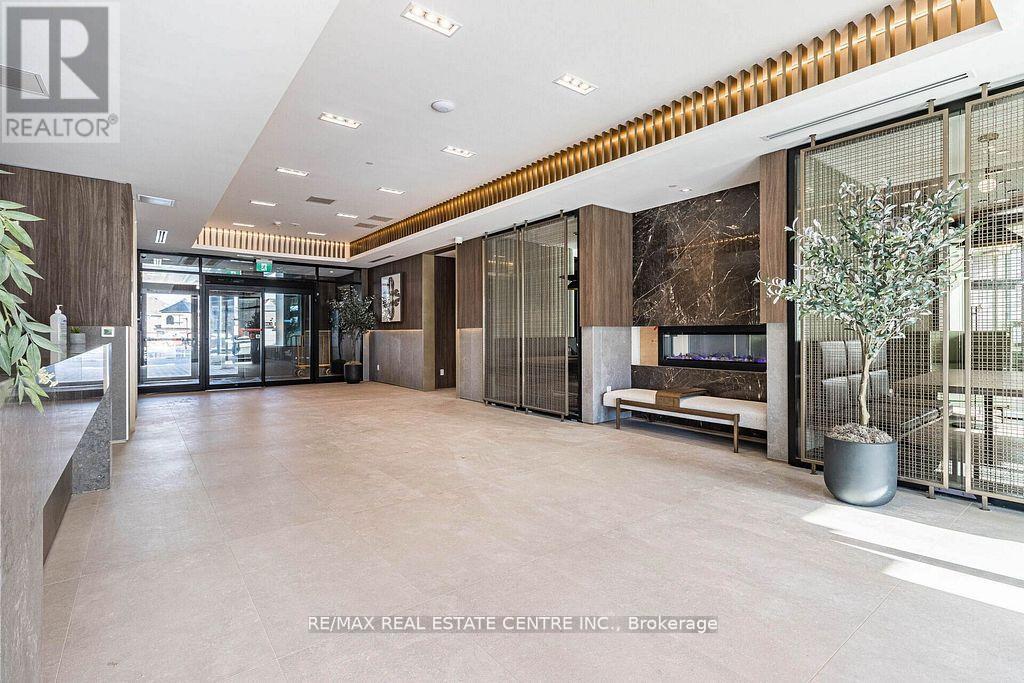 309 - 2501 Saw Whet Boulevard E, Oakville, Ontario  L6L 0H5 - Photo 2 - W12920360