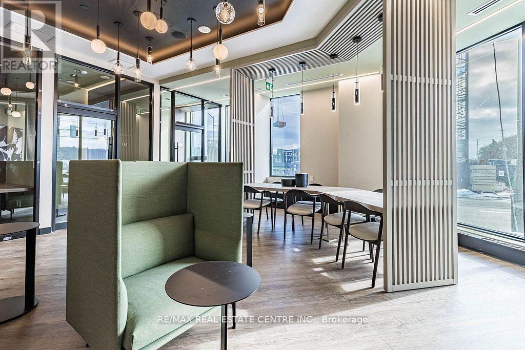 309 - 2501 Saw Whet Boulevard E, Oakville, Ontario  L6L 0H5 - Photo 3 - W12920360