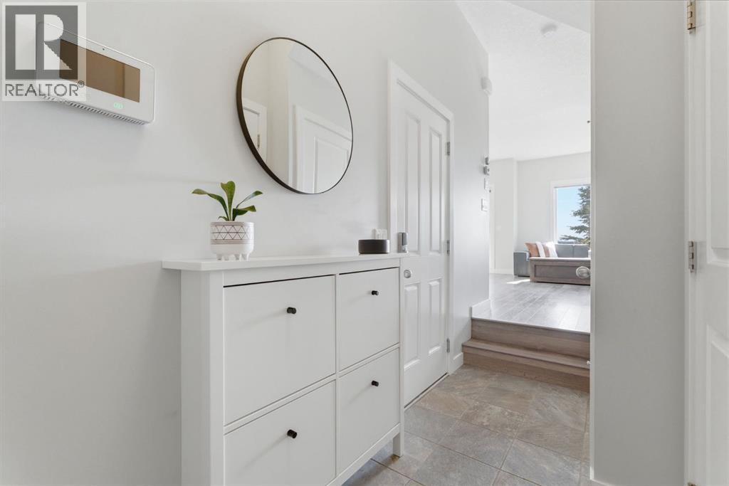 1208 Jumping Pound Common, Cochrane, Alberta  T4C 2L1 - Photo 7 - A2294424