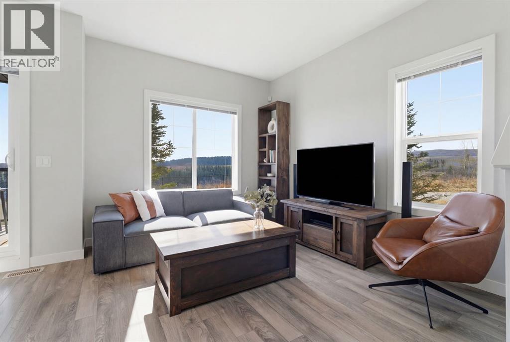 1208 Jumping Pound Common, Cochrane, Alberta  T4C 2L1 - Photo 4 - A2294424