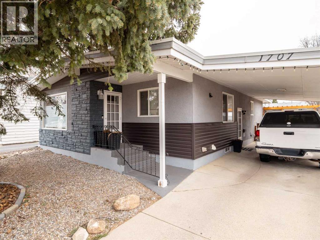 1707 Lakemount Boulevard S, Lethbridge, Alberta  T1K 3K5 - Photo 3 - A2296210