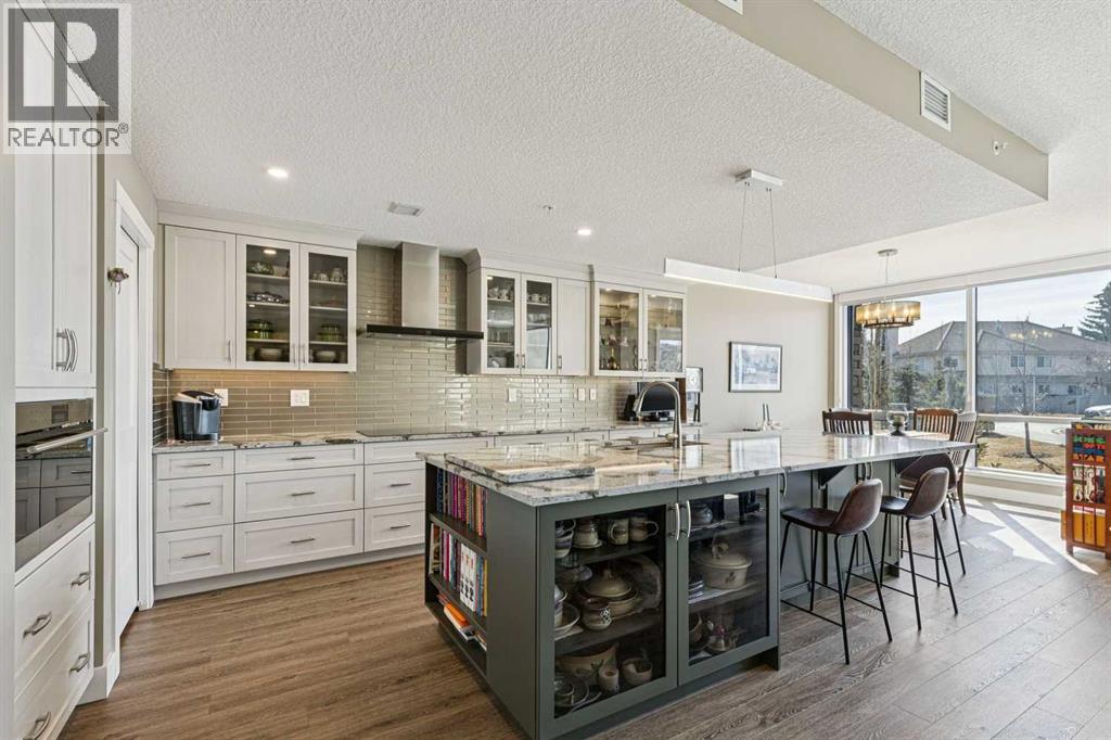 312, 15 Cougar Ridge Landing Sw, Calgary, Alberta  T3H 6C3 - Photo 4 - A2295603