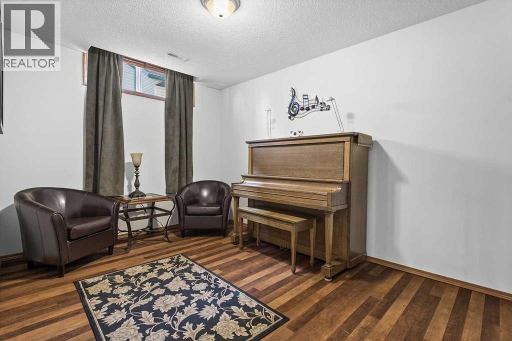122 West Terrace Place, Cochrane, Alberta  T4C 1S2 - Photo 40 - A2295833