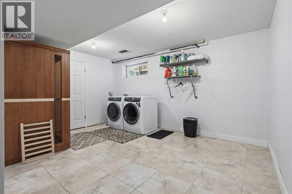 212 Coachway Lane Sw, Calgary, Alberta  T3H 2V9 - Photo 27 - A2293656