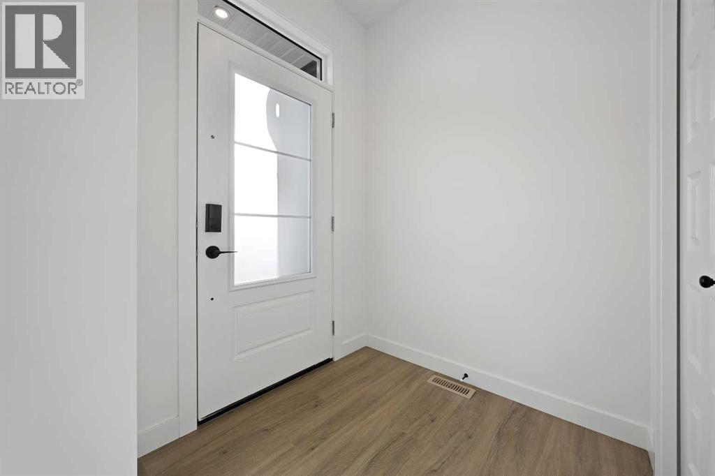 2226 Bayview Drive Sw, Airdrie, Alberta  T4B 5N4 - Photo 2 - A2289337