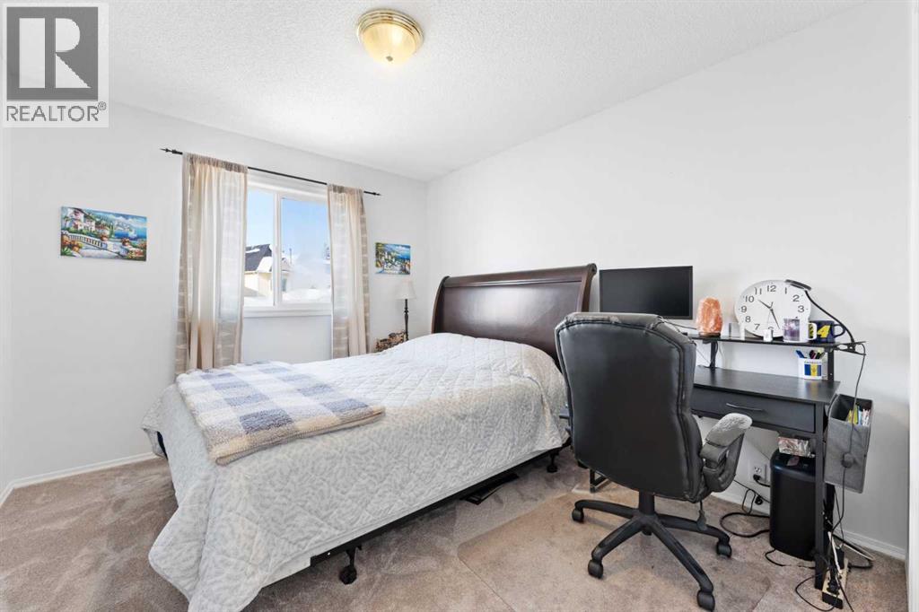 33 Tuscany Valley View Nw, Calgary, Alberta  T3L 2A5 - Photo 19 - A2293994