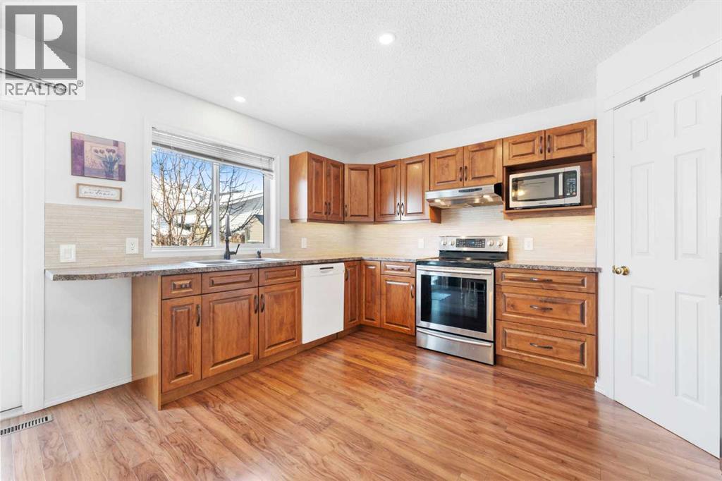 33 Tuscany Valley View Nw, Calgary, Alberta  T3L 2A5 - Photo 6 - A2293994