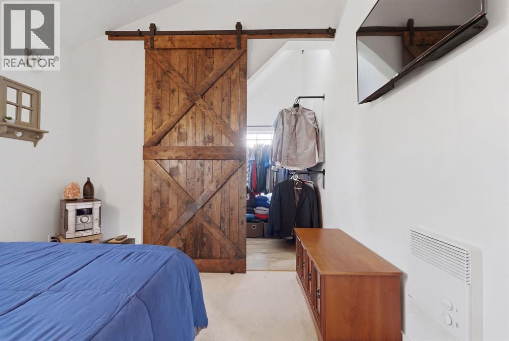 212 Cottageclub Crescent, Rural Rocky View County, Alberta  T2K 1B3 - Photo 17 - A2291790