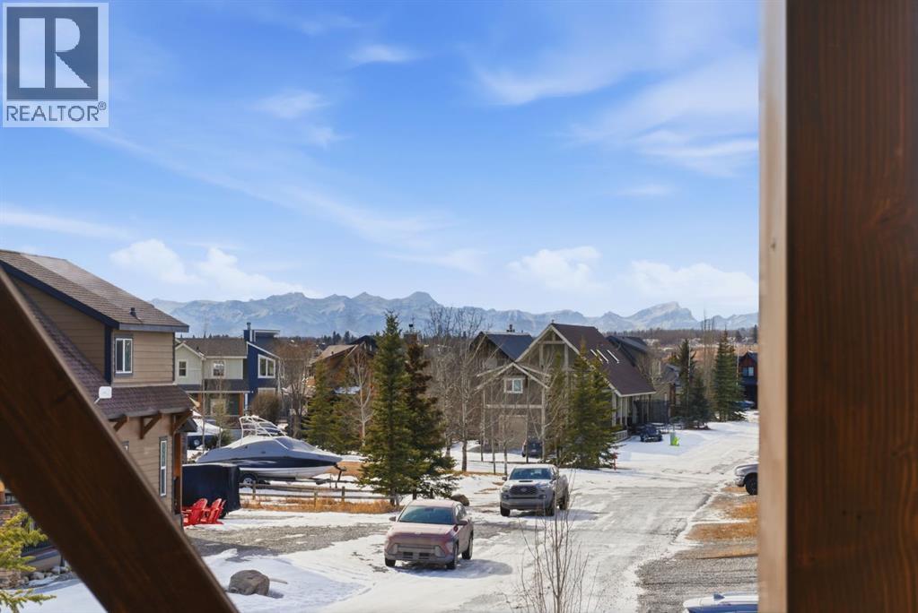 212 Cottageclub Crescent, Rural Rocky View County, Alberta  T2K 1B3 - Photo 23 - A2291790