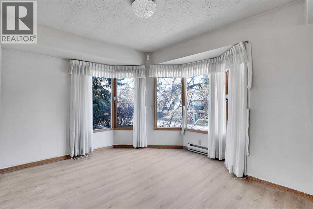 1956 Kelwood Drive SW, Calgary, Alberta  T3E 3Z3 - Photo 9 - A2275340