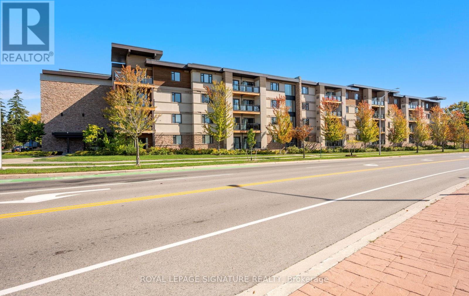 413 - 128 Garden Drive, Oakville, Ontario  L6K 0H7 - Photo 2 - W12921834