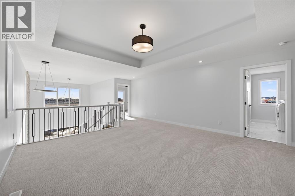 709 Dawson Common, Chestermere, Alberta  T1X 1Z7 - Photo 20 - A2286486