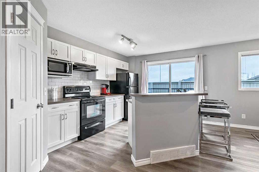 106 Panatella Park Nw, Calgary, Alberta  T3K 6K4 - Photo 7 - A2296393