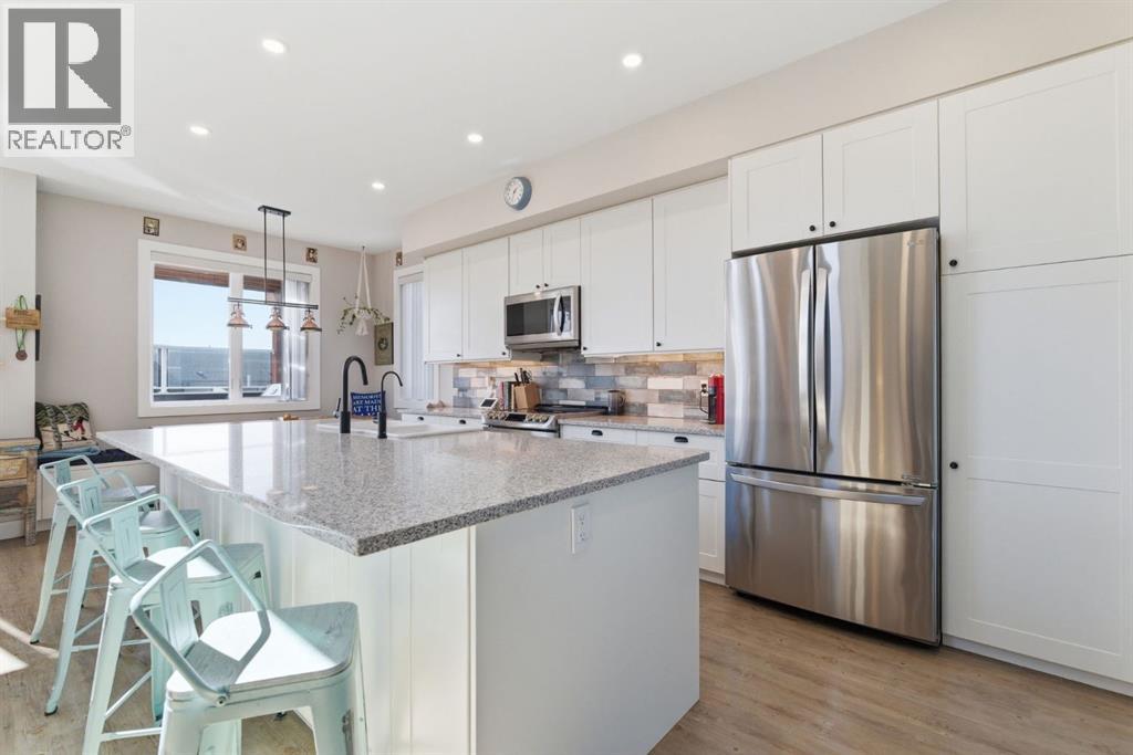 419 Cottageclub Cove, Rural Rocky View County, Alberta  T4C 1B4 - Photo 4 - A2294510