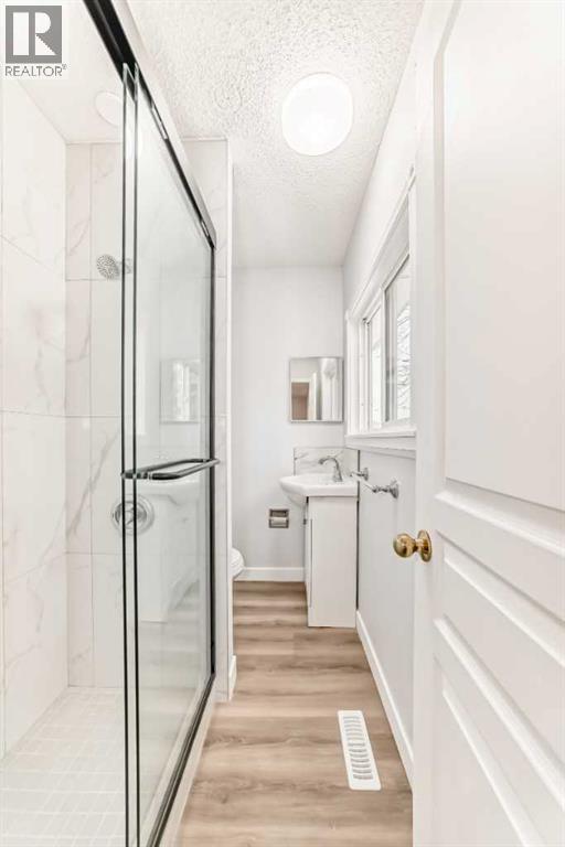 307 Huntridge Road NE, Calgary, Alberta  T2K 4B8 - Photo 23 - A2272014