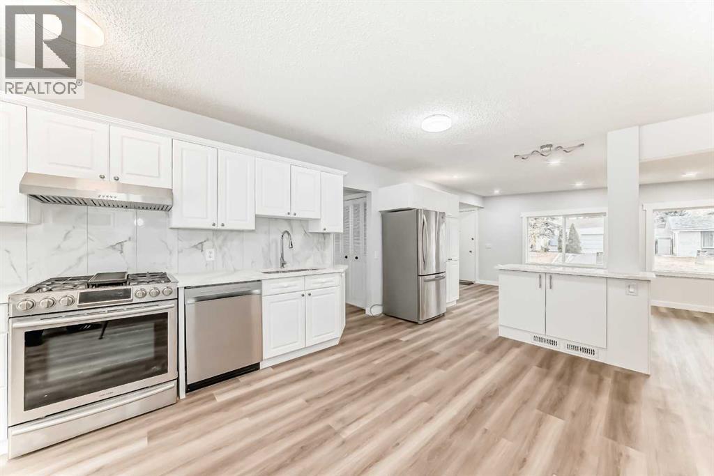 307 Huntridge Road NE, Calgary, Alberta  T2K 4B8 - Photo 12 - A2272014