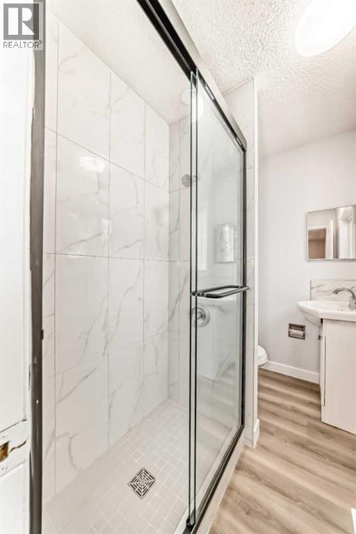 307 Huntridge Road NE, Calgary, Alberta  T2K 4B8 - Photo 24 - A2272014