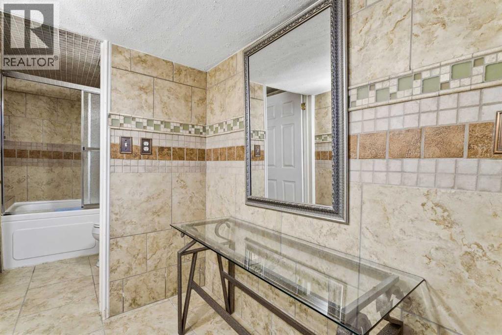414 Mt Cornwall Circle Se, Calgary, Alberta  T2J 2J6 - Photo 37 - A2294883