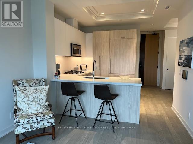 407 - 123 Maurice Drive, Oakville, Ontario  L6K 2W6 - Photo 9 - W12922700