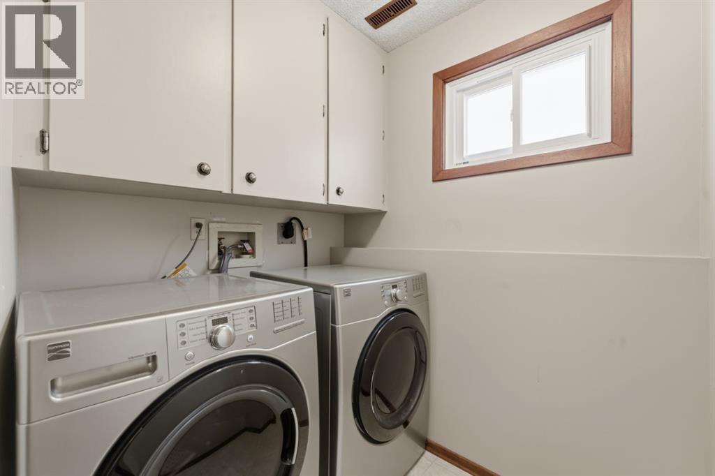 28 Woodstock Way Sw, Calgary, Alberta  T2W 5X3 - Photo 10 - A2293726