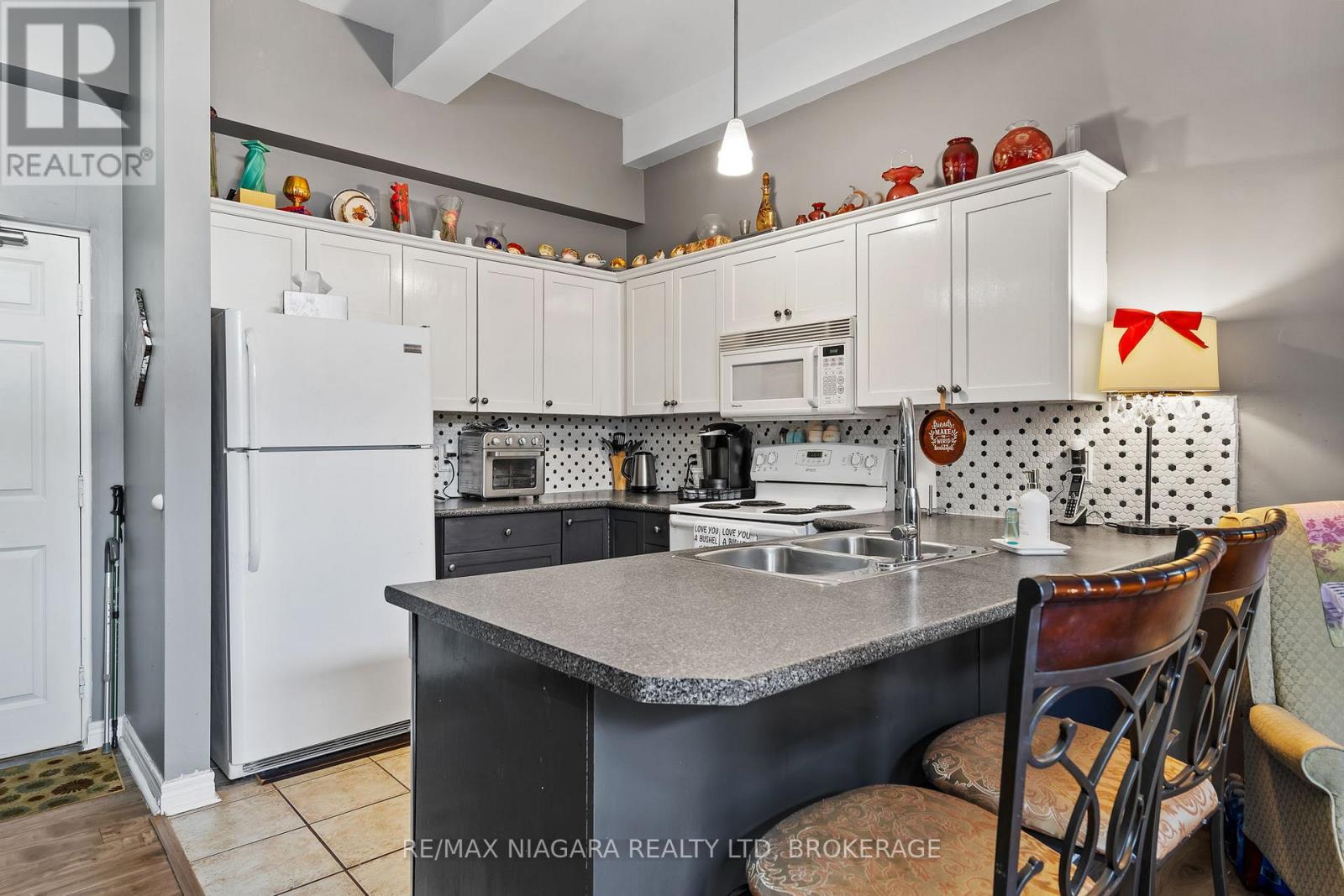 103 - 6365 Drummond Road, Niagara Falls, Ontario  L2G 4N1 - Photo 5 - X12922934