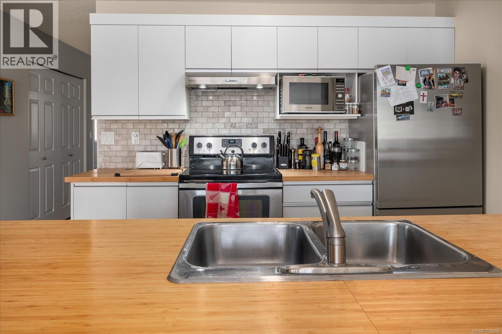 17 6245 Blueback Rd, Nanaimo, British Columbia  V9V 1N7 - Photo 7 - 1029695