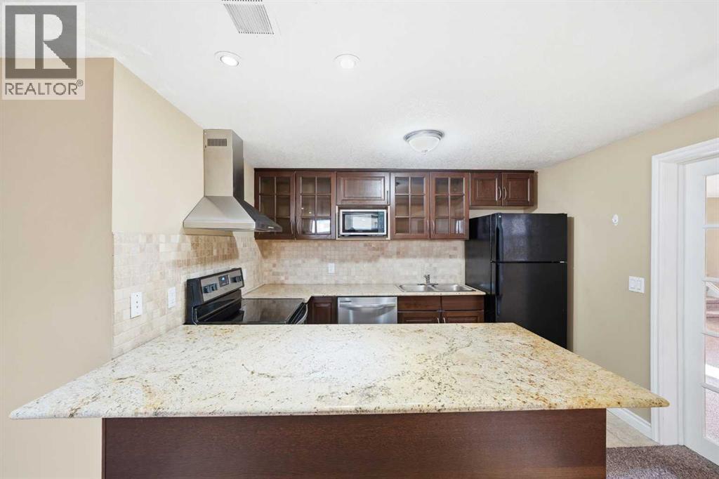 1447 Northmount Drive NW, Calgary, Alberta  T2L 0G7 - Photo 33 - A2295699