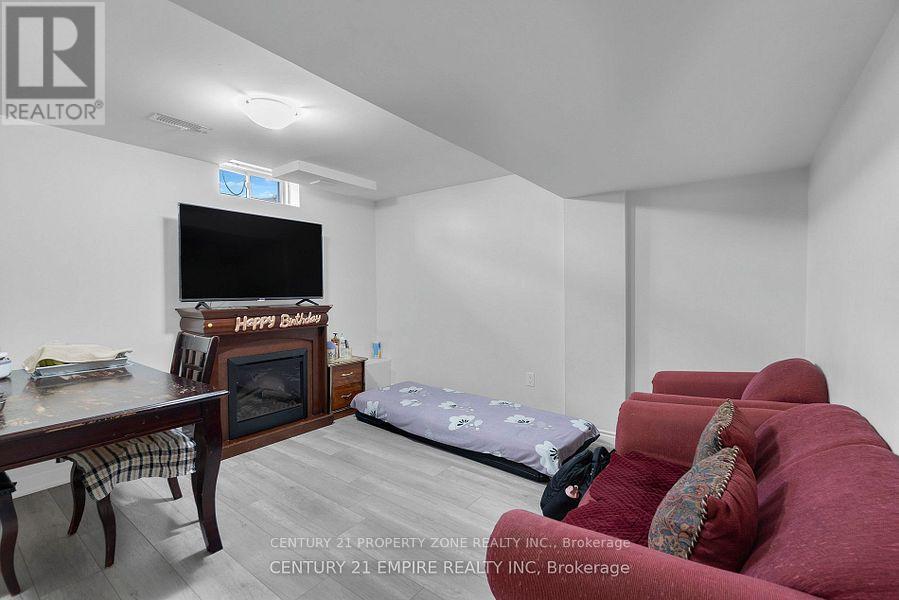 Bsmt - 68 Florette Place, Brampton (Fletcher's Meadow), Ontario  L7A 3G5 - Photo 2 - W12923766