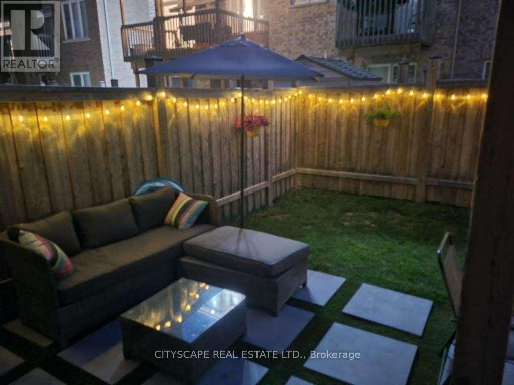 22 Rockbrook Trail, Brampton, Ontario  L7A 4H8 - Photo 4 - W12923772