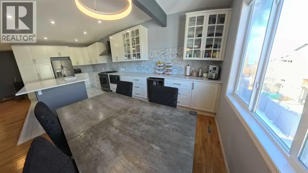 466 Cimarron Boulevard, Okotoks, Alberta  T1S 0H7 - Photo 4 - A2292029