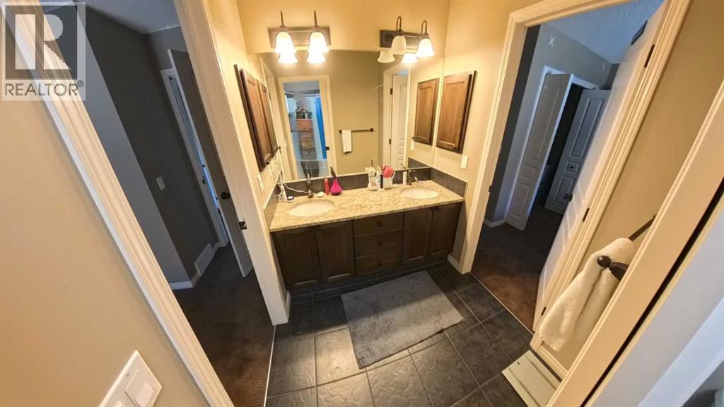 466 Cimarron Boulevard, Okotoks, Alberta  T1S 0H7 - Photo 12 - A2292029
