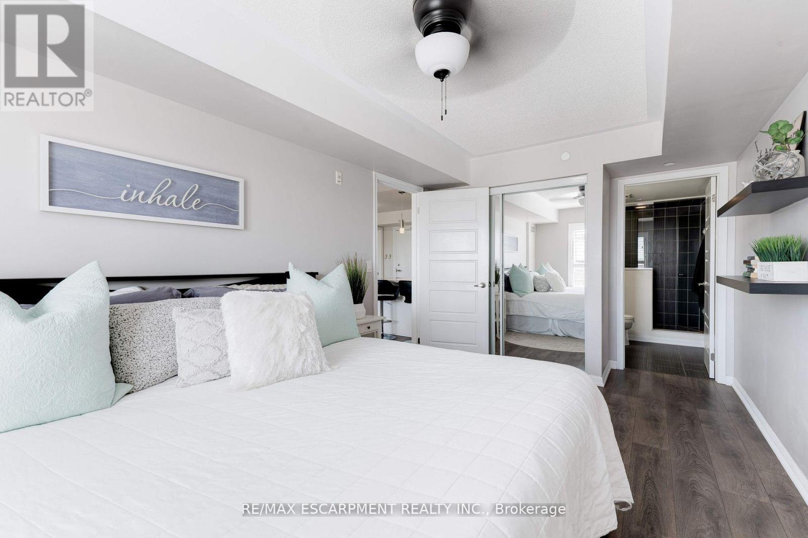 406 - 1045 Nadalin Heights, Milton, Ontario  L9T 8R5 - Photo 2 - W12924378