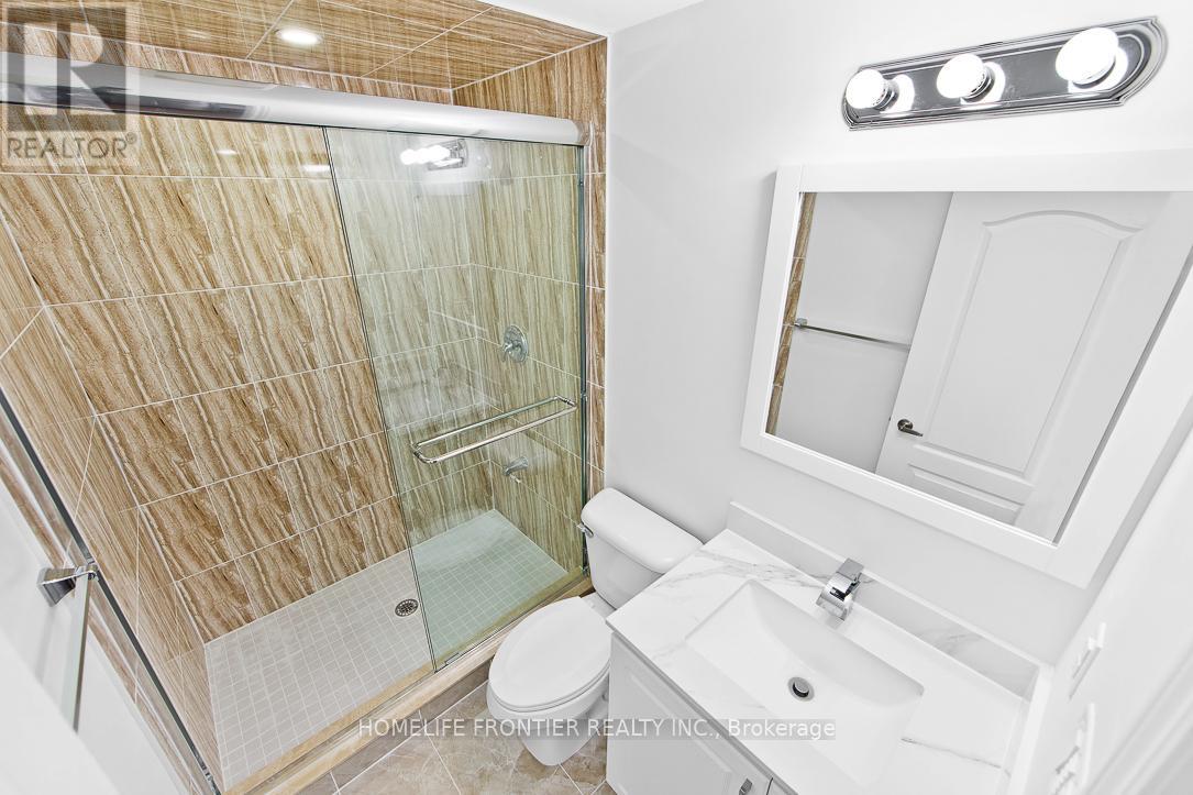 Lower - 311 Hinton Terrace, Milton, Ontario  L9E 1C8 - Photo 12 - W12903542