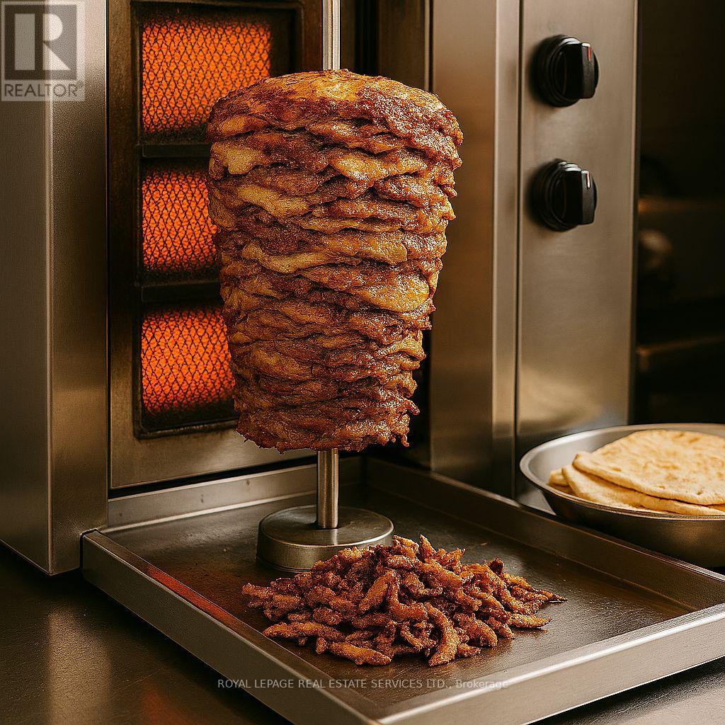 110 - 5555 Eglinton Avenue W, Toronto, Ontario  M9C 5M1 - Photo 2 - W12921828