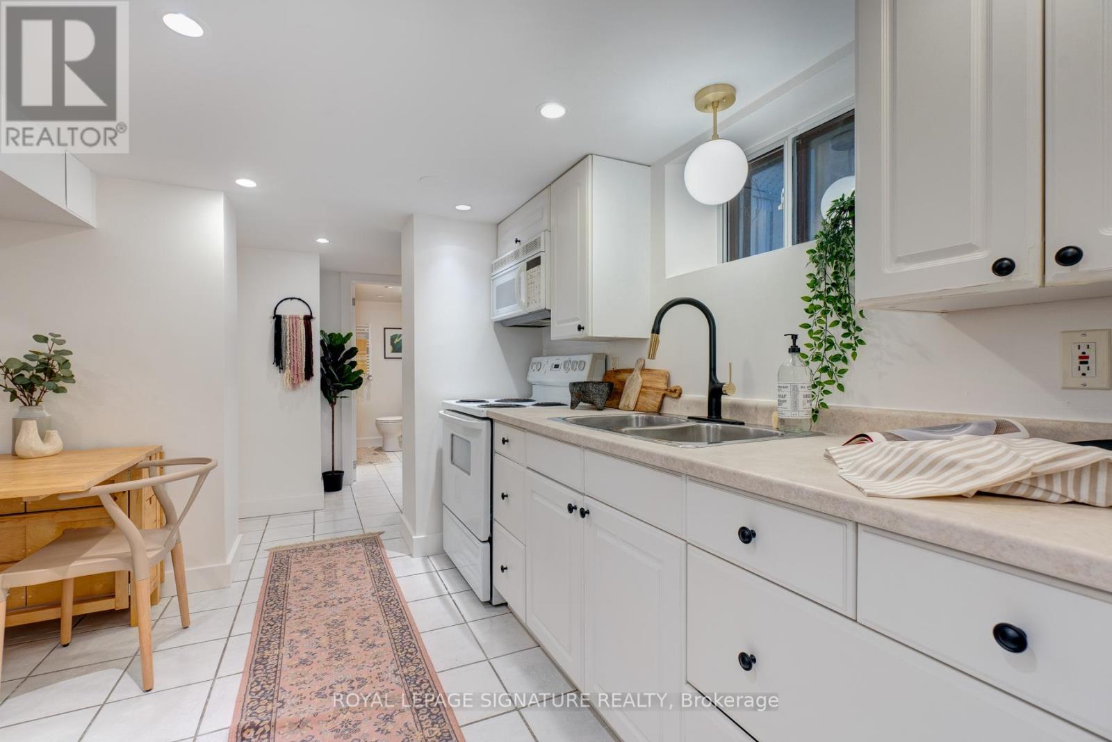 Lower - 512 Runnymede Road, Toronto, Ontario  M6S 2Z7 - Photo 6 - W12924462