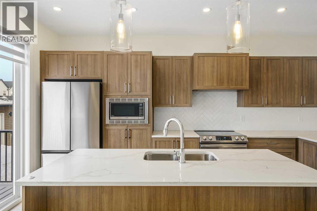 1308 South Point Parade SW, Airdrie, Alberta  T4B 5P3 - Photo 12 - A2284050