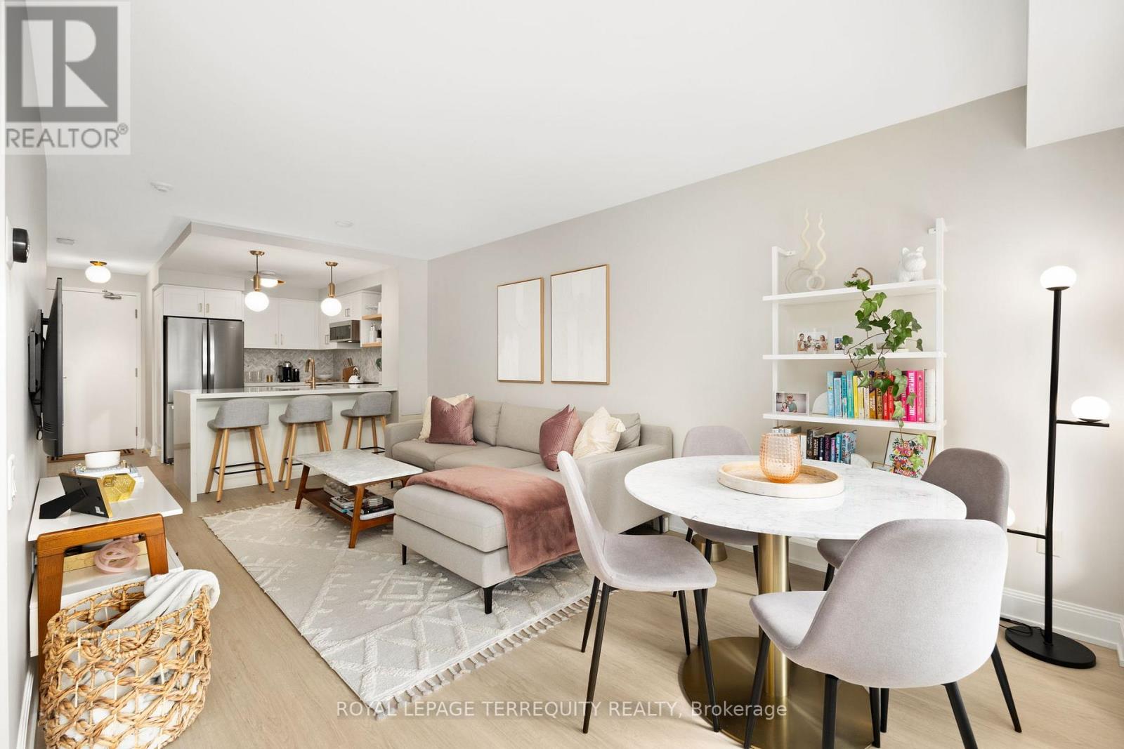 Fully renovated 1+Den at Yonge & Eglinton, offering bright south-facing exposure and nearly 700sqft of thoughtfully upgraded living space. Over $80K has been invested in renovations, making this a true turnkey option for buyers who want quality without the need for further updates. The kitchen has been completely redesigned with custom cabinetry, quartz countertops, backsplash, stainless steel appliances, popcorn ceiling removed, and dropped pendant lighting. The bathroom has also been fully updated, including vanity, toilet, bathtub, fixtures, tile floor and washer and dryer. Complemented by new doors, and built-in closet organizers in the hallway closet and bedroom, while luxury vinyl flooring runs throughout the rest of the unit. Positioned on the quieter, courtyard-facing side of the building, the unit offers a more peaceful setting along with a private balcony and plenty of natural light. Located directly across from TTC access, including the new Eglinton Crosstown LRT, this is an ideal option for buyers seeking convenience, space, and a move-in ready home in one of Toronto's most connected neighbourhoods. With a walk score of 99, everything you need is just steps away. The unit also includes a locker, and residents enjoy access to a full range of amenities including a gym, indoor pool, sauna, games room, and parcel locker system. A turnkey condo where the work has already been done - simply move in and enjoy. (id:48254)