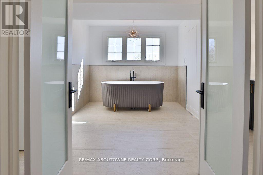 63 Tradewind Drive, Oakville, Ontario  L6L 6K8 - Photo 33 - W12865776