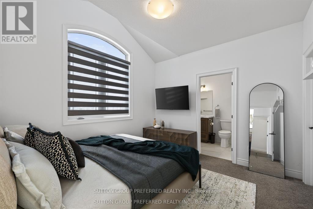 105 Harvest Lane, Thames Centre, Ontario  N0L 1G2 - Photo 36 - X12925168