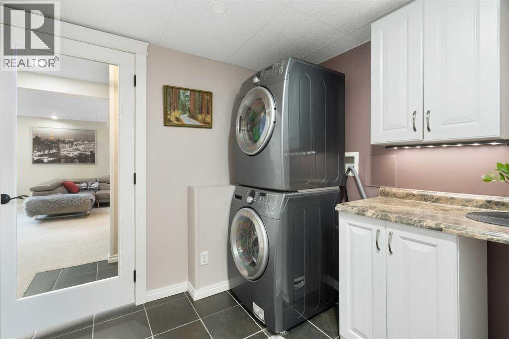 26 Bow Close, Cochrane, Alberta  T4C 1M9 - Photo 38 - A2289064