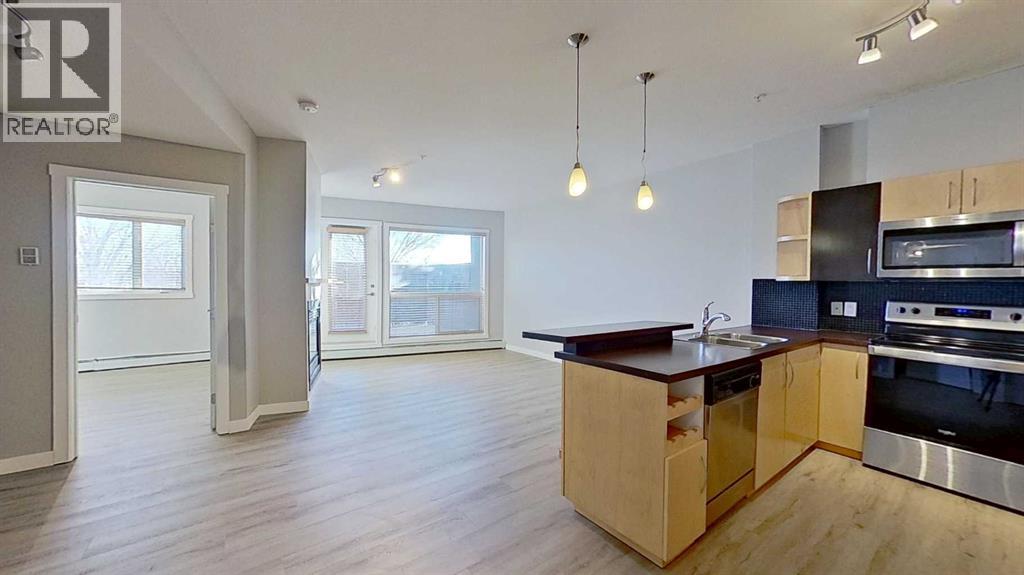 121, 69 Springborough Court SW, Calgary, Alberta  T3H 5V5 - Photo 2 - A2281359