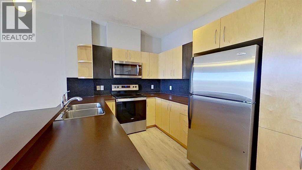 121, 69 Springborough Court SW, Calgary, Alberta  T3H 5V5 - Photo 3 - A2281359