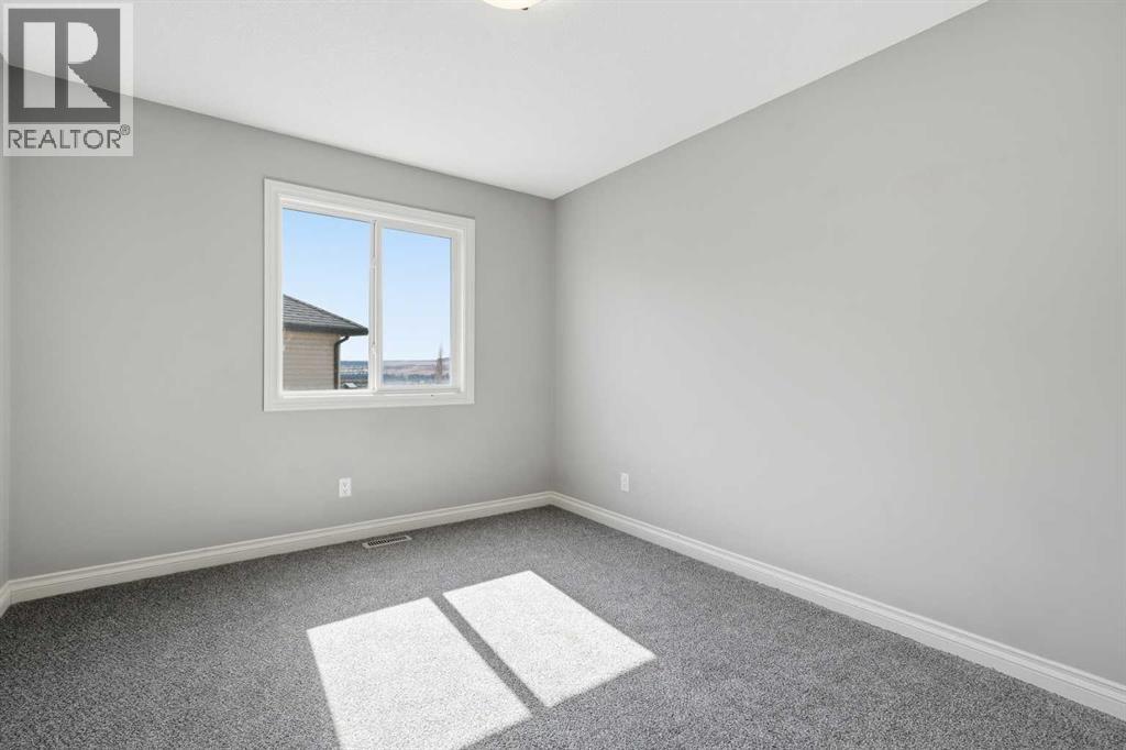 110 Heritage Place Ne, Cochrane, Alberta  T4C 0E2 - Photo 25 - A2294654