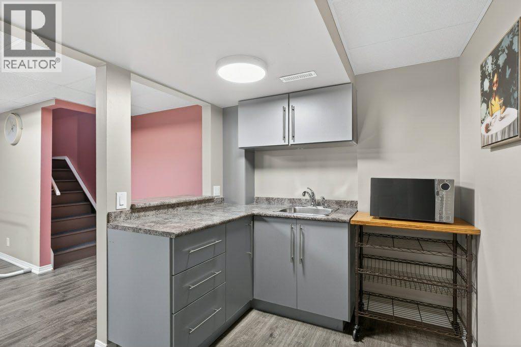 1012 Windsong Drive Sw, Airdrie, Alberta  T4B 0P2 - Photo 47 - A2293220