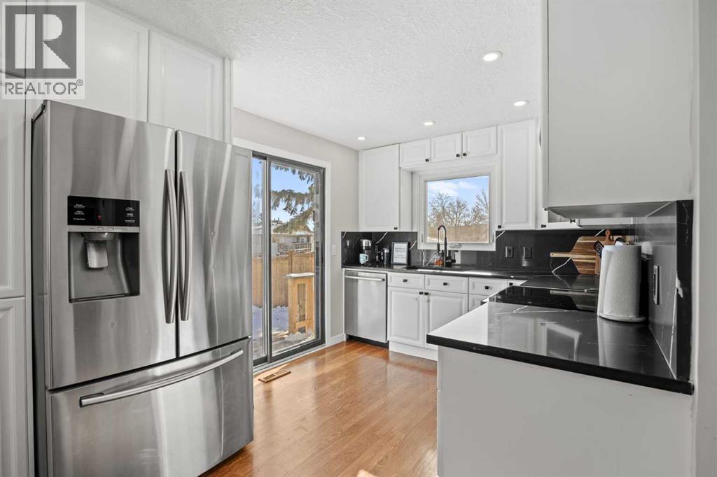 23 Millbank Drive SW, Calgary, Alberta  T2Y 2B5 - Photo 11 - A2288793