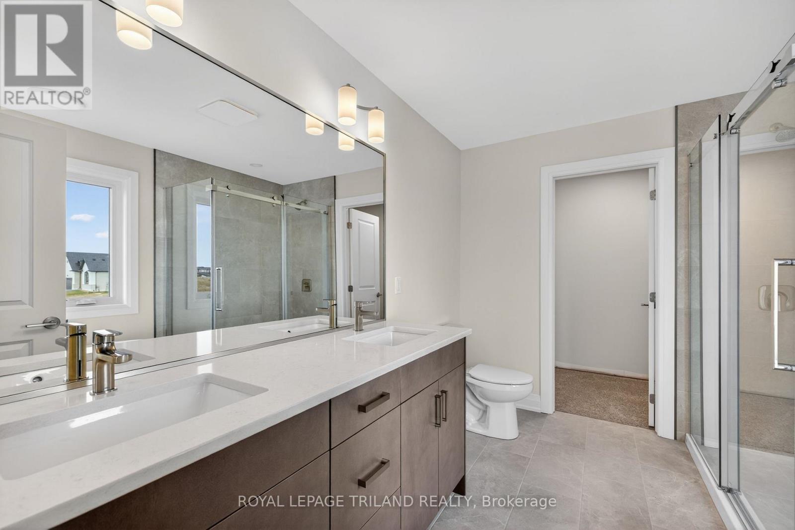 28 Allister Drive, Middlesex Centre, Ontario  N0L 1R0 - Photo 22 - X12925544