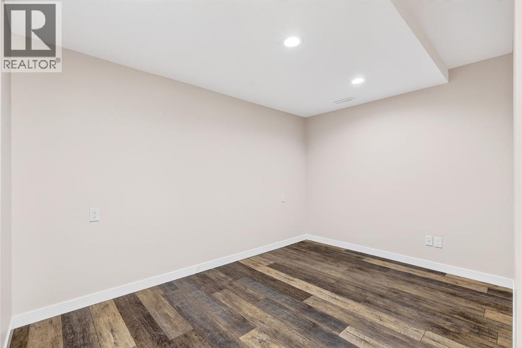 31 Sunset Crescent, Okotoks, Alberta  T1S 1P3 - Photo 18 - A2296617