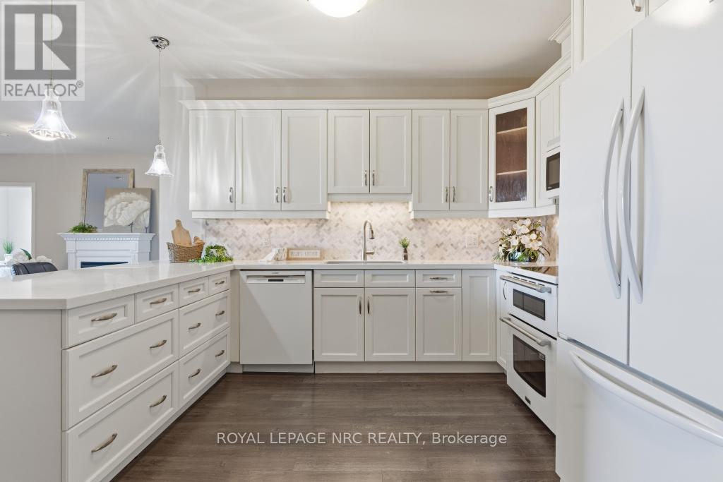 401 - 379 Scott Street, St. Catharines, Ontario  L2M 3W2 - Photo 6 - X12926002