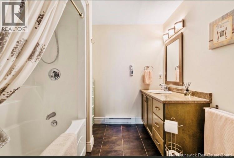 69 Cap Bimet Boulevard Unit# 209, Grand-Barachois, New Brunswick  E4P 6X5 - Photo 23 - NB134291